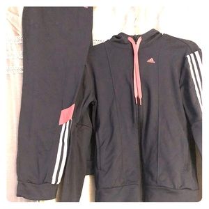 Woman’s adidas track outfit